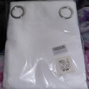 Brand new never opened white polyester curtains